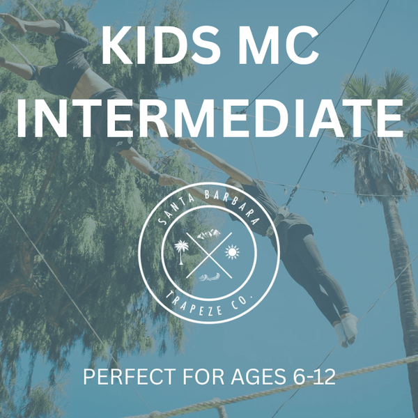 First-time student mid-air catch on flying trapeze at Santa Barbara Trapeze Co.